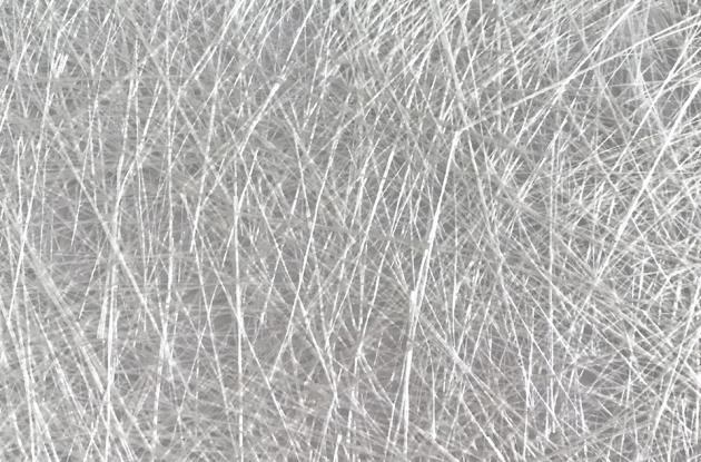 Je sklolaminát kompozitný materiál?